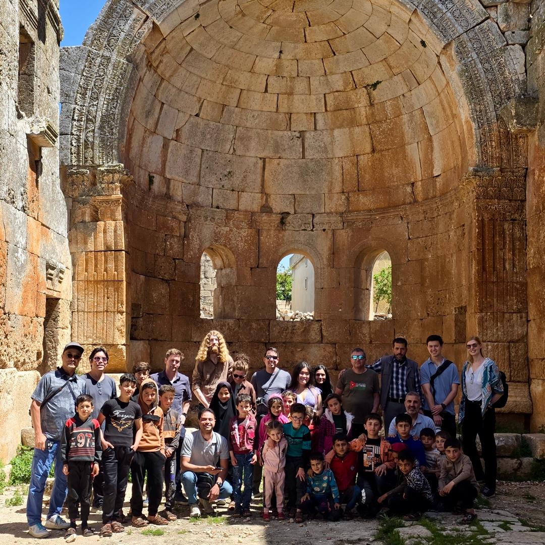 syrian guides easter group tour qalb lozeh idlib group photo with locals
