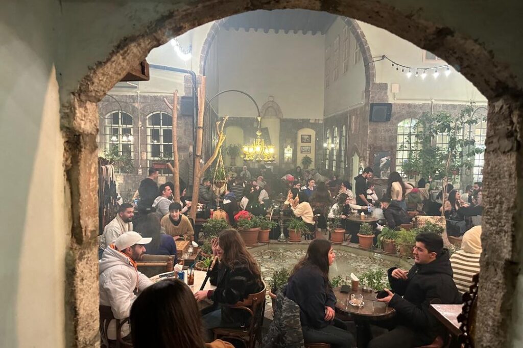 Looking for a spot where history and coffee blend perfectly? Discover Qishla Café, a 150-year-old gem in Damascus. Step in and savor the past with every sip!
