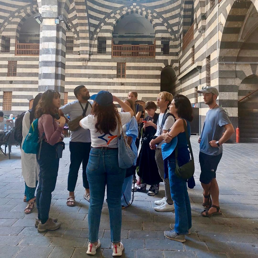 Syrian Guides guests visiting Khan Asaad Pasha in Damascus