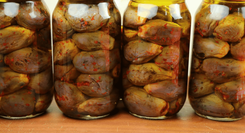 Makdous is Syria’s “summer in a jar”: stuffed baby eggplants in olive oil. Learn its origins, ritual, taste, benefits, and why to try it on Syria tours.