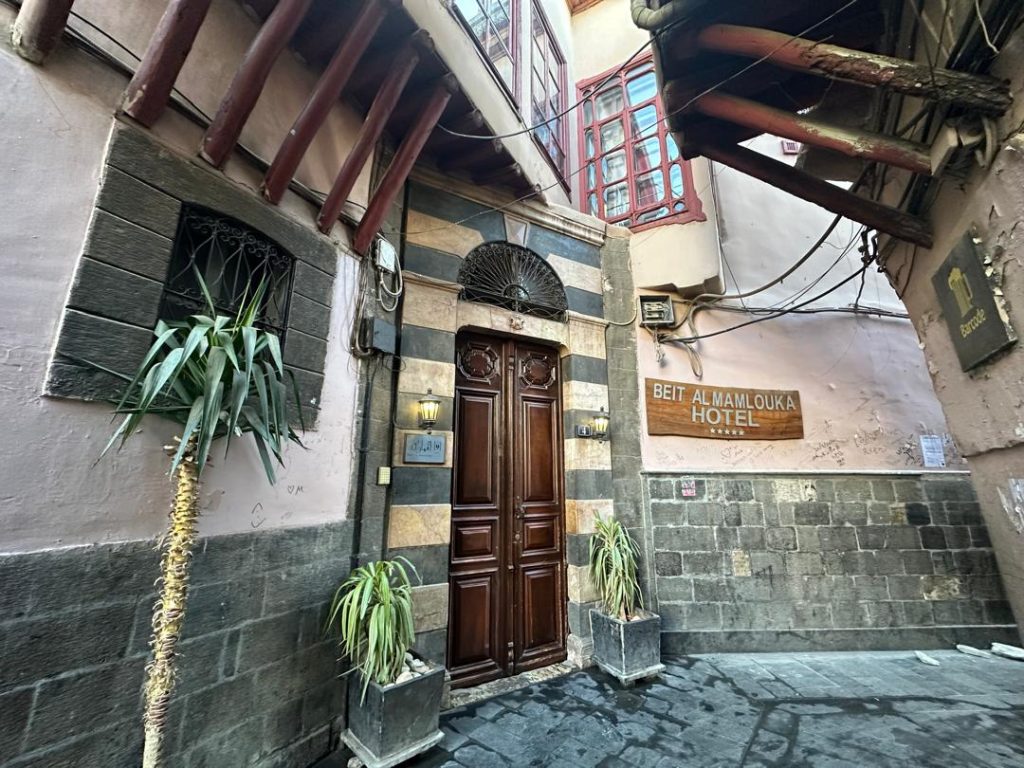 Step behind Damascus’s plain doors to discover hidden courtyards, fountains, jasmine, and the lasting beauty of traditional Damascene homes in Old Damascus too.